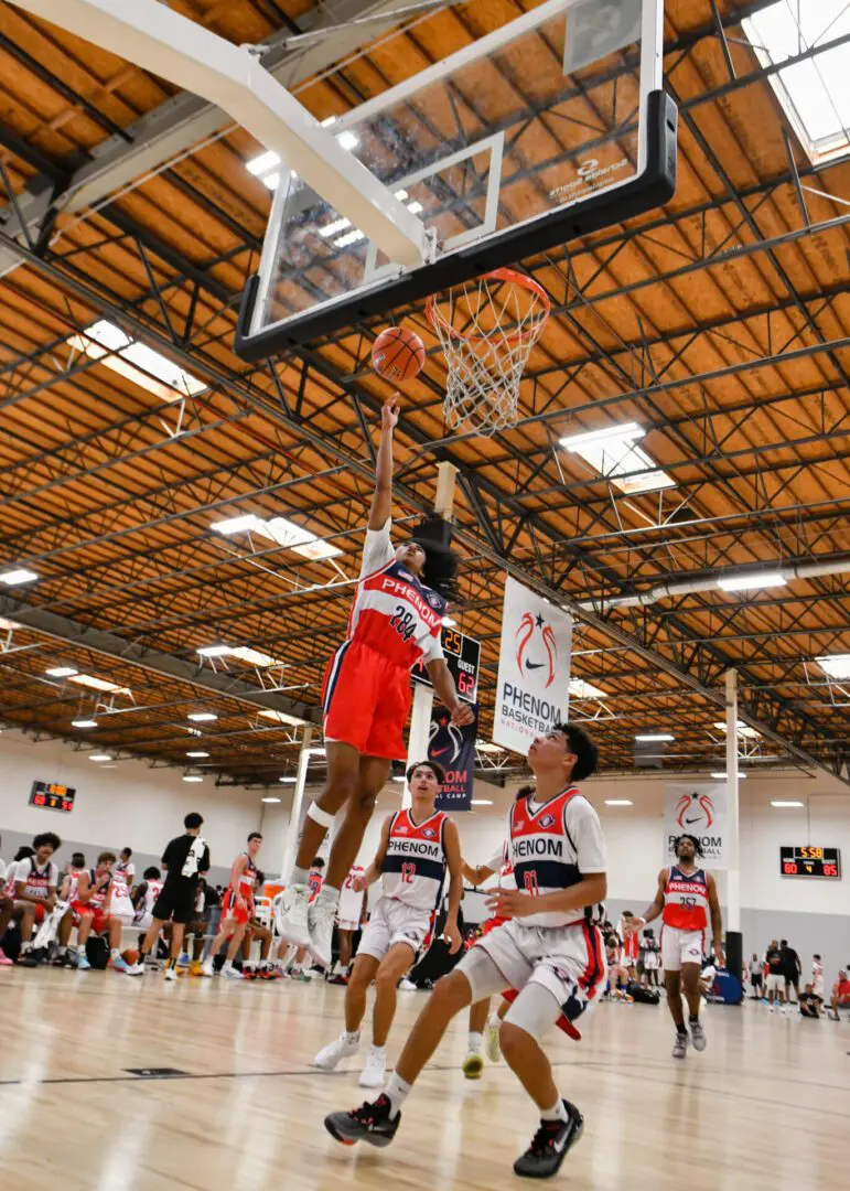 Some players scoring basket at the court