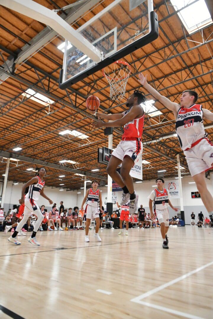 Some long height children playing basket ball