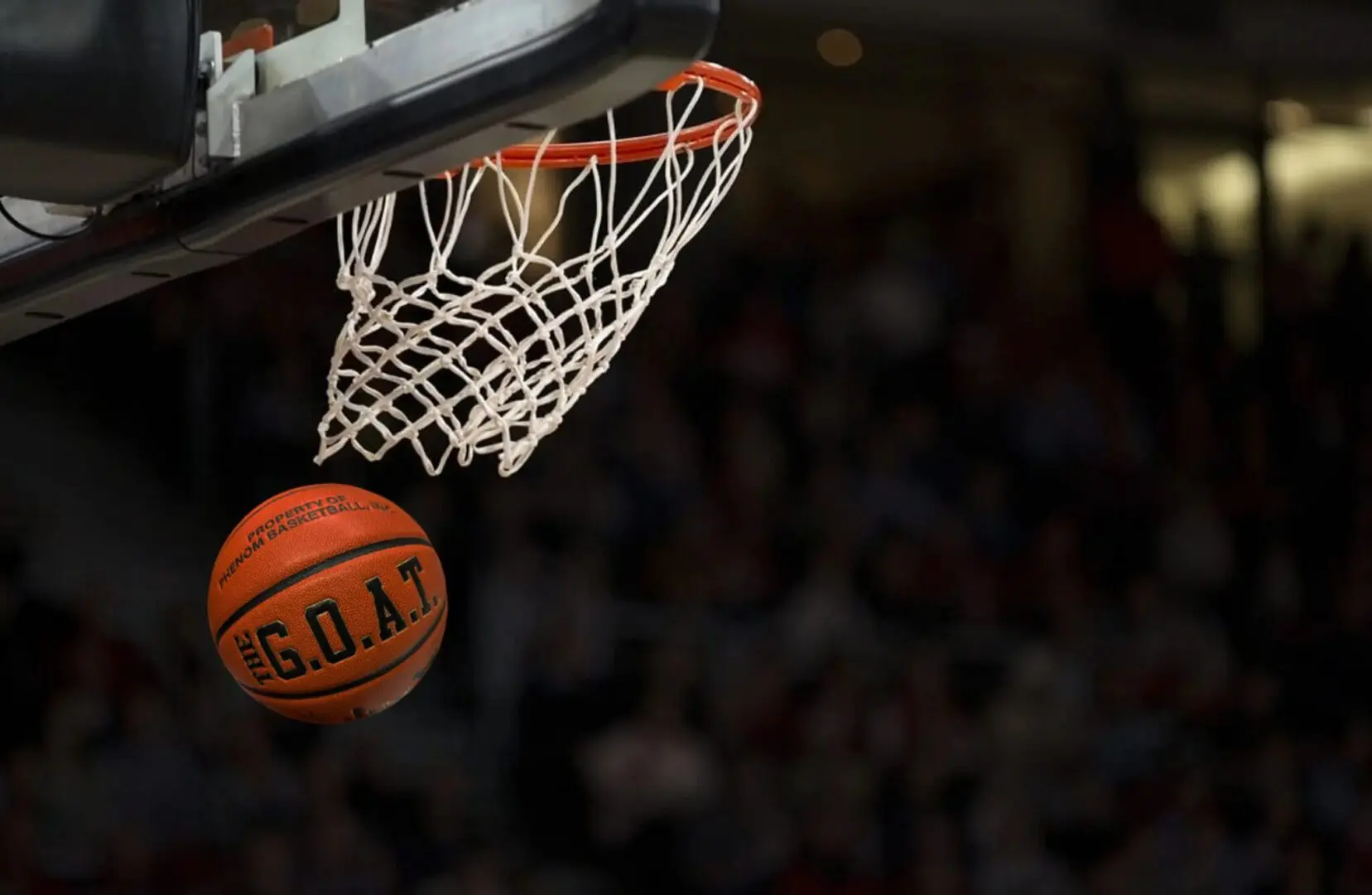 cf760330-df5a-4d94-9da8-ccc28616be4a Basketball swishing through net.